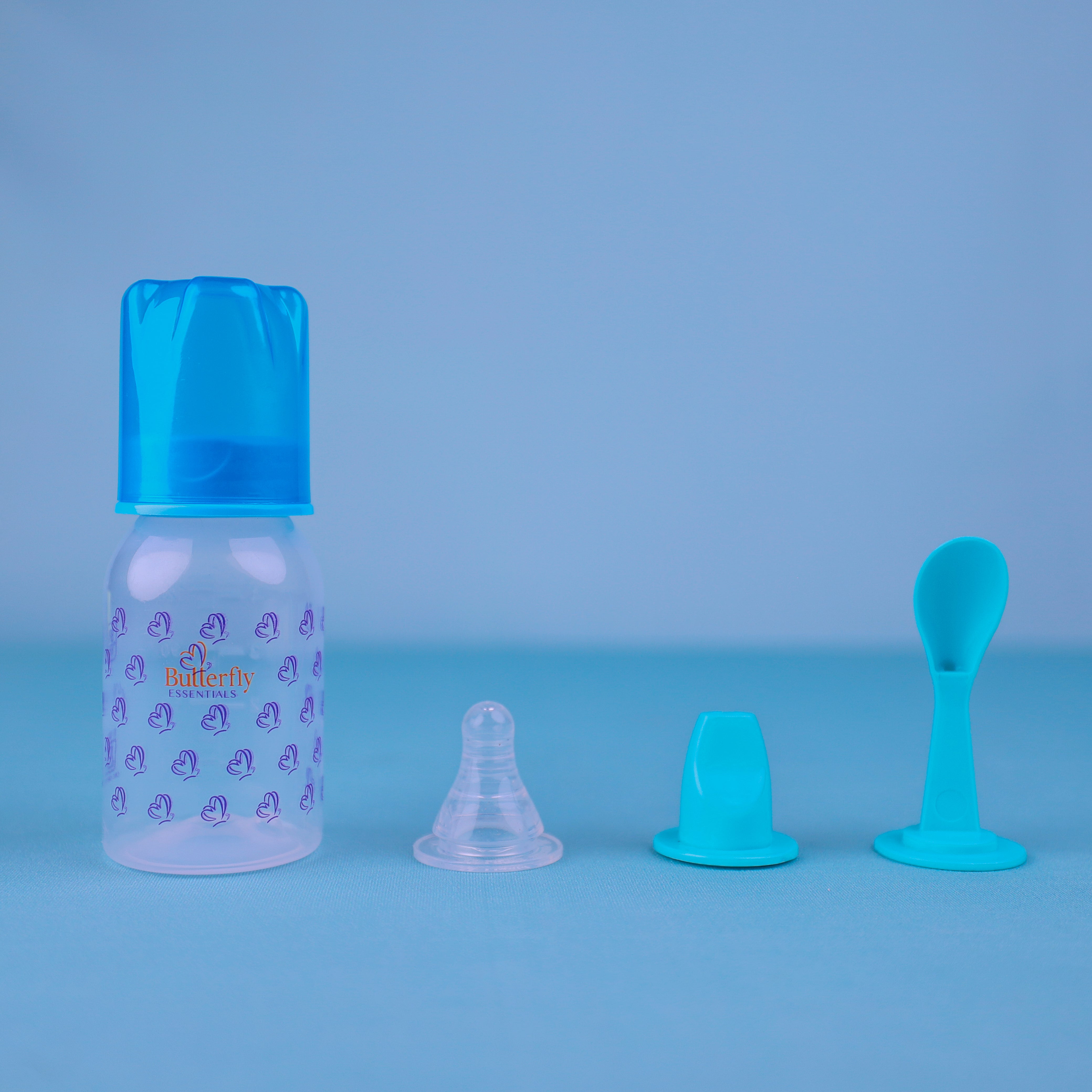 FEEDING BOTTLE WITH SPOON